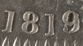 1819 stamped as an overdate Crown George III